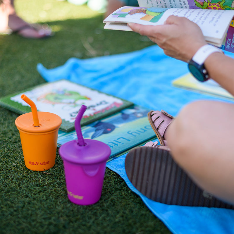 kid-s-sippy-cup-and-water-bottle-set-u3 10oz_kids_cups_straw_reading_blanket_square.jpg
