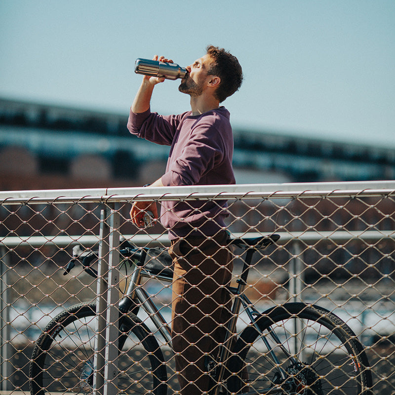 20oz-rise-reflect-with-bamboo-cap-m3 16oz_rise_reflect_man_bike_square.jpg