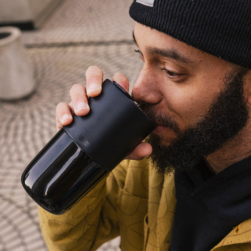 16oz-rise-tumbler-u6 16oz_rise_tumbler_black_man_drink_square.jpg