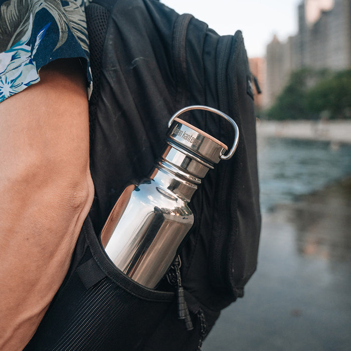 27oz-reflect-with-bamboo-cap-z0 K27SSLRF-MS-BAMBOO_reflect-bottle_backpack_lifestyle.jpg
