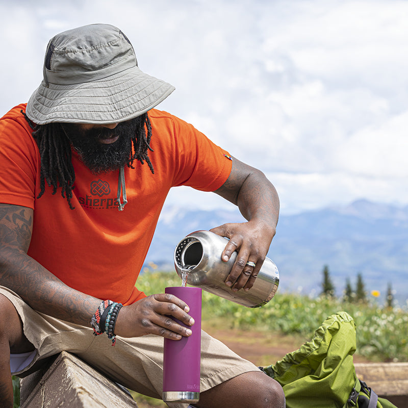 64oz-tkwide-with-loop-cap-j5 tkwide_64oz_bottle_backpacker_mountains_filling_square.jpg
