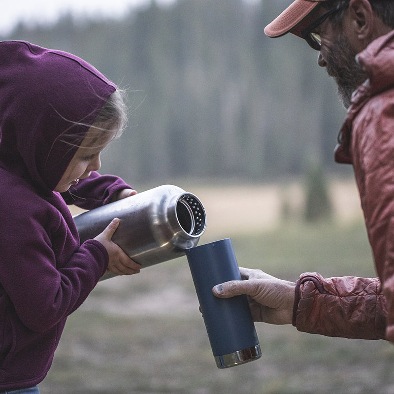64oz-tkwide-with-loop-cap-j5 tkwide_64oz_bottle_girl_dad_filling_square.jpg